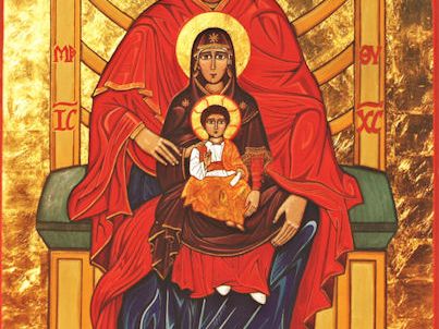 A gold and red religious icon showing three generations seated together.